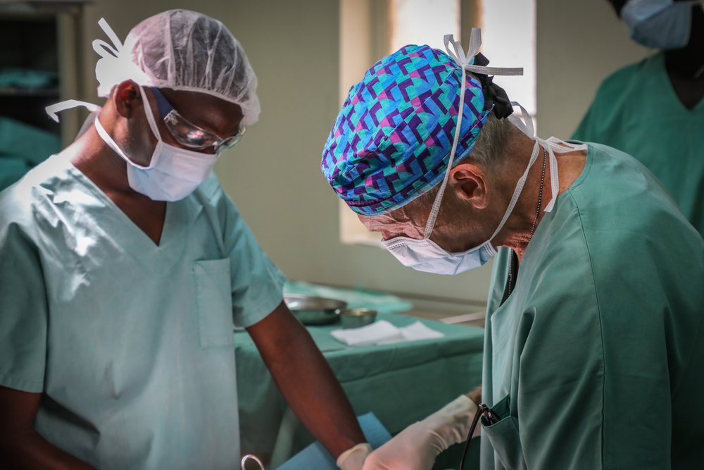 MSF surgeon performing a fasciotomy