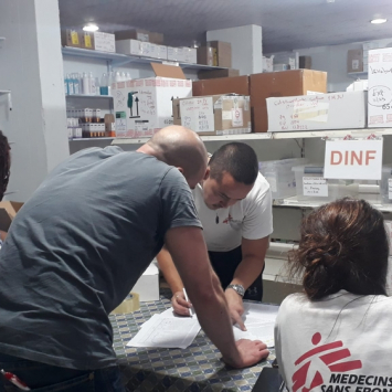 MSF staff prepare a medical supplies donation for the ministry of health in Gaza after Israeli strikes on October 8, 2023