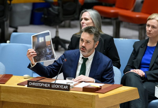 Christopher Lockyear, secretary general of Médecins Sans Frontières (MSF), holds up an image of the destroyed MSF shelter in Al-Mawasi in Khan Younis, Gaza. An MSF staff member’s wife and daughter-in-law were killed and six other people were injured when an Israeli tank fired on a clearly marked MSF staff shelter on February 20, 2024. Lockyear called on the United Nations Security Council (UNSC) to demand an immediate and sustained ceasefire in Gaza. Addressing the Council at its monthly meeting on Gaza, Lockyear also called for the unequivocal protection of medical facilities, staff, and patients.