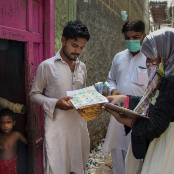 Mask distribution in Machar Colony