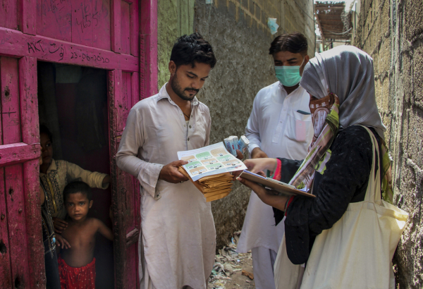Mask distribution in Machar Colony