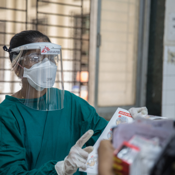 MSF nurse giving instrctions for safety.jpg