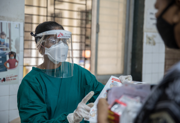 MSF nurse giving instrctions for safety.jpg